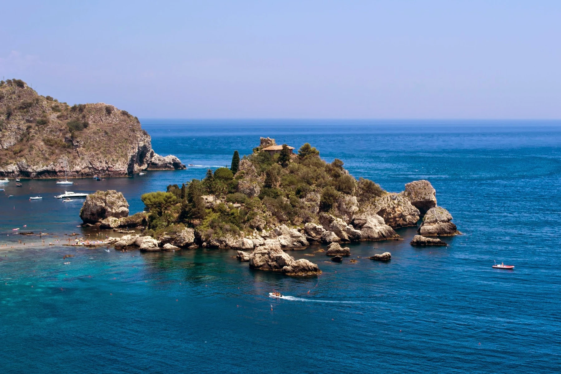 Real Isola Bella and bay below Taormina